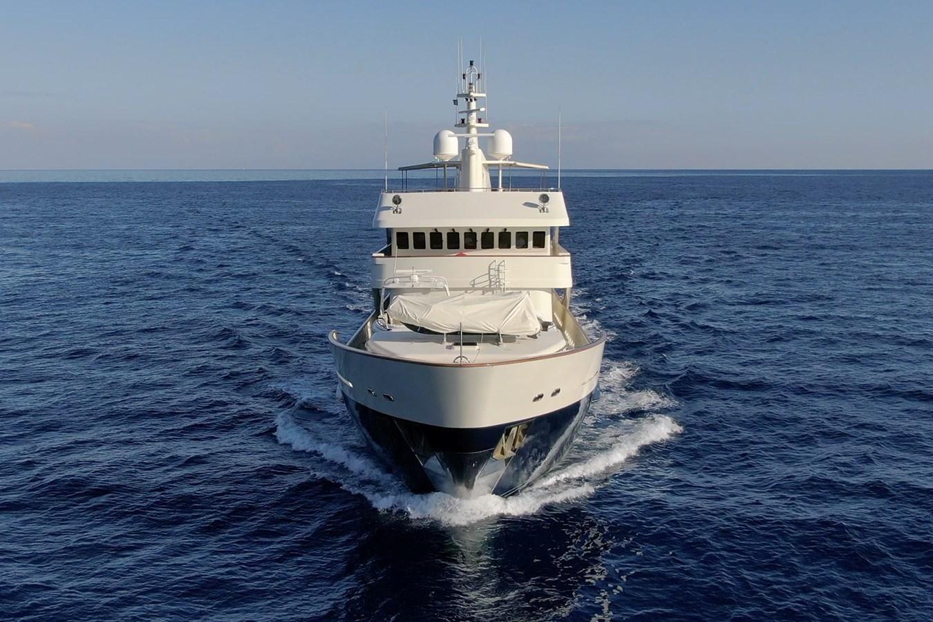 a white boat on the water aboard LIBERTA Yacht for Sale