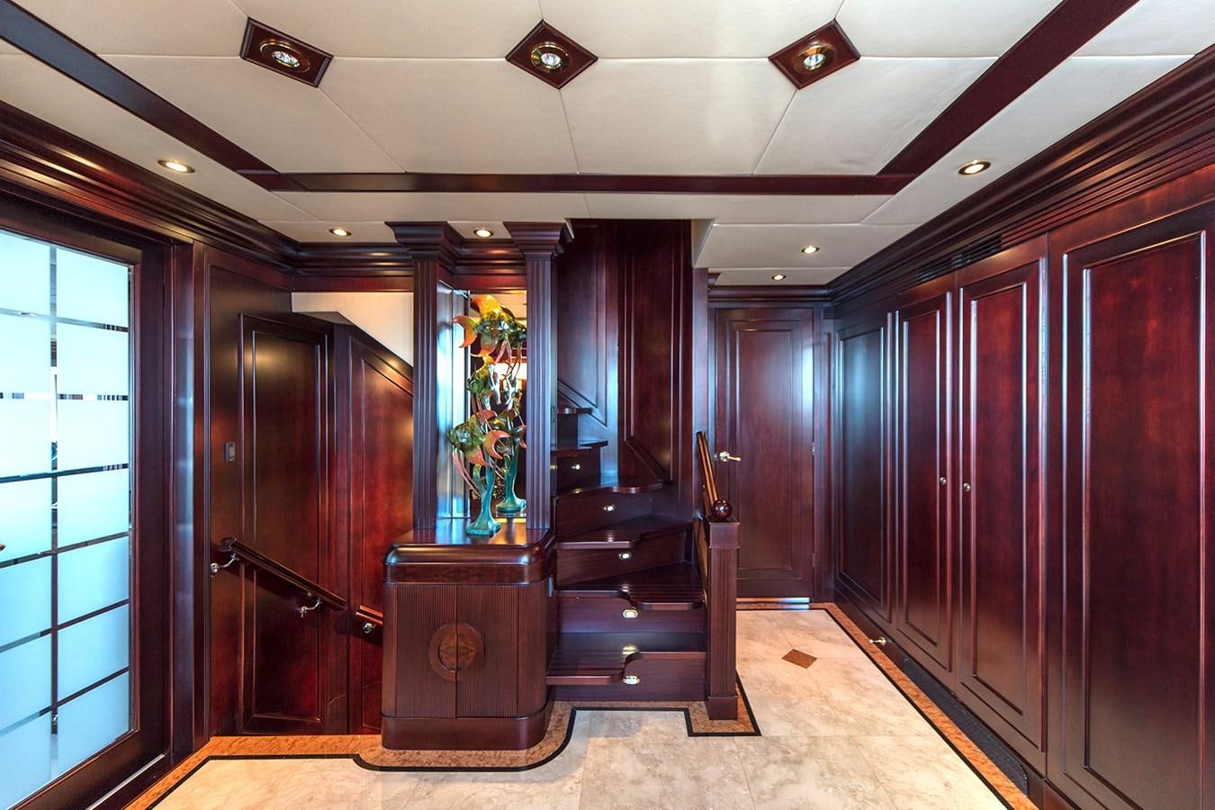 a room with a wood cabinet and a large window aboard LIBERTA Yacht for Sale
