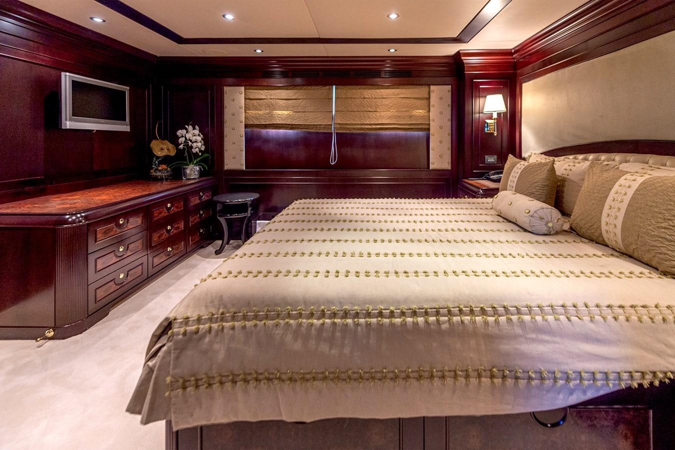 a large bed in a hotel room aboard LIBERTA Yacht for Sale