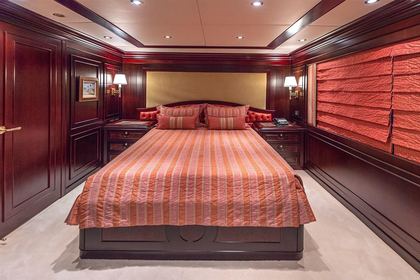a bed in a hotel room aboard LIBERTA Yacht for Sale