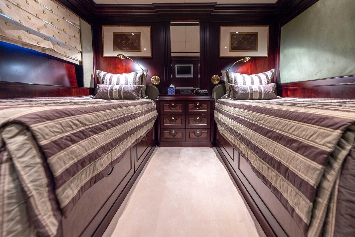 a room with two beds aboard LIBERTA Yacht for Sale