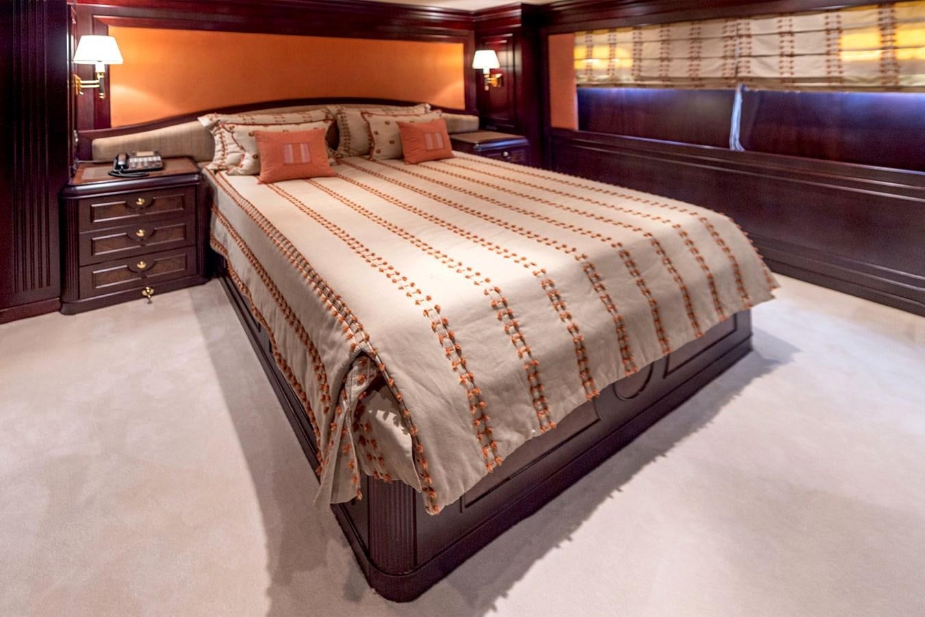 a bed in a room aboard LIBERTA Yacht for Sale