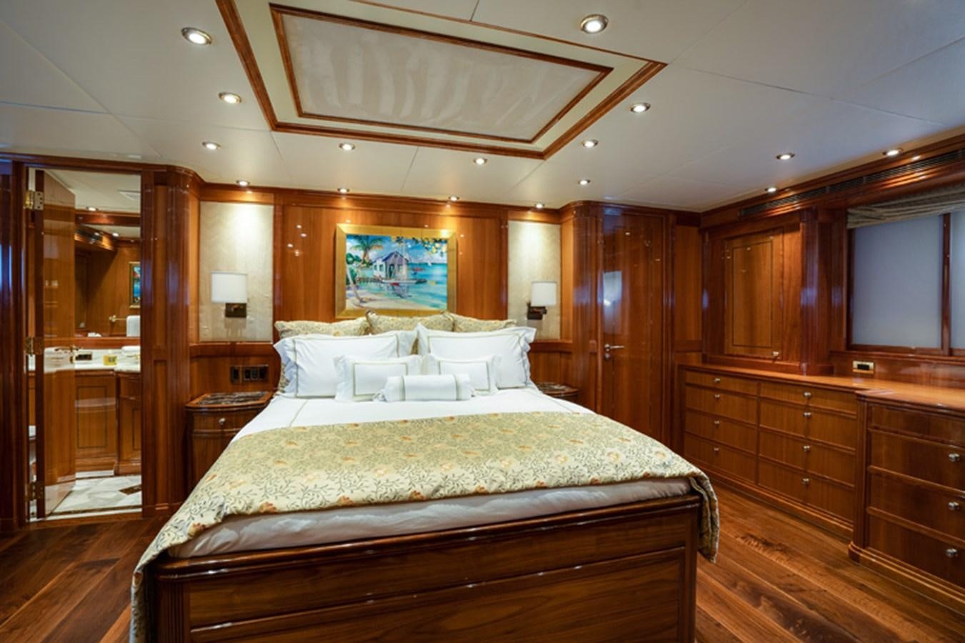 a large bedroom with a large bed aboard TEMPTATION Yacht for Sale