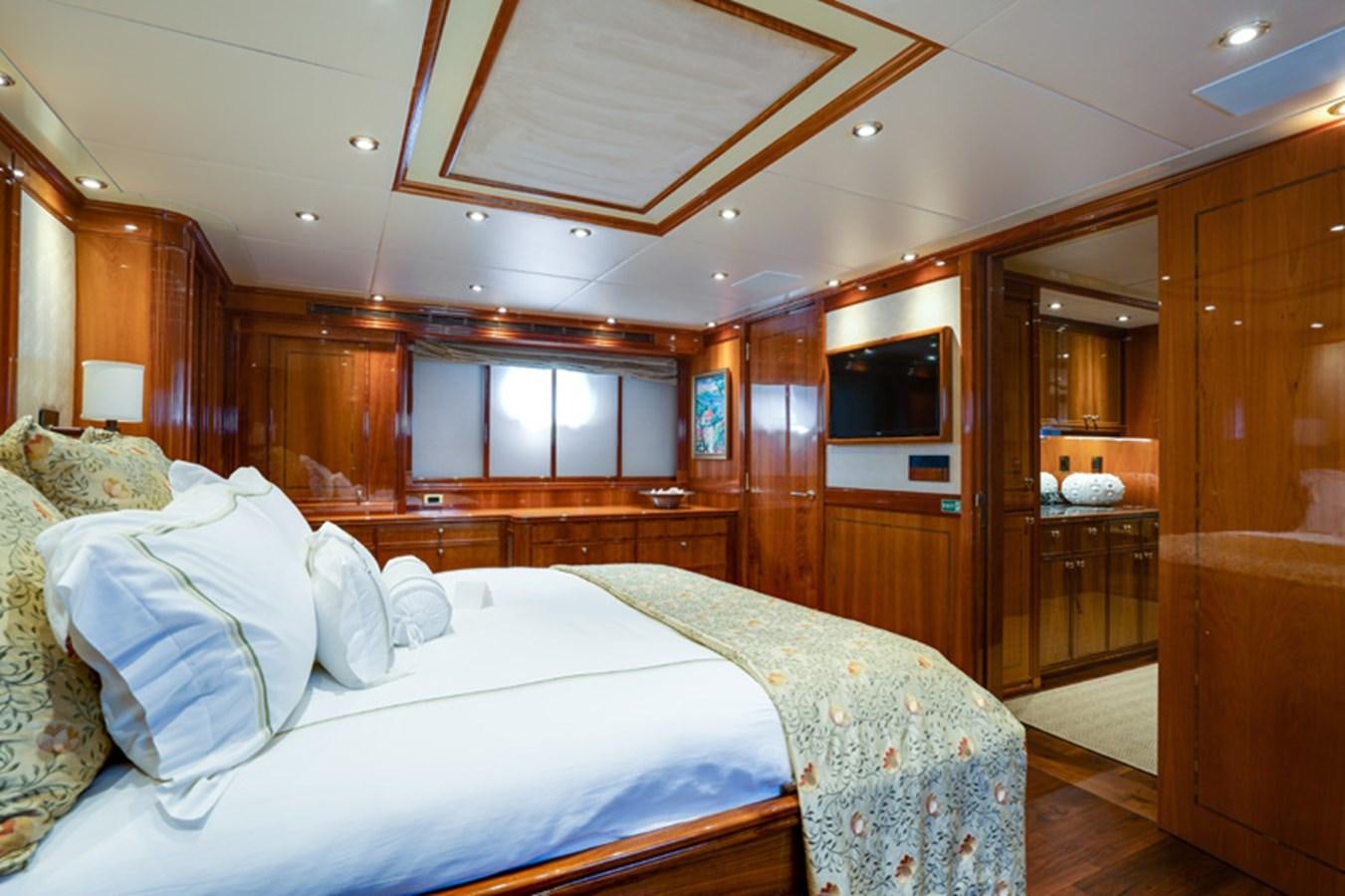 a room with two beds aboard TEMPTATION Yacht for Sale