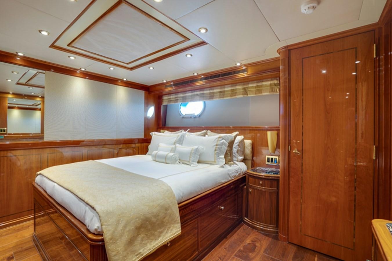 a couple of beds in a room aboard TEMPTATION Yacht for Sale