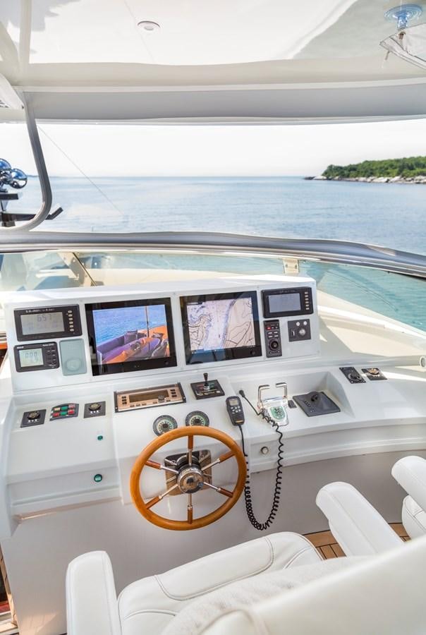 a vehicle with a bicycle on the front aboard TEMPTATION Yacht for Sale