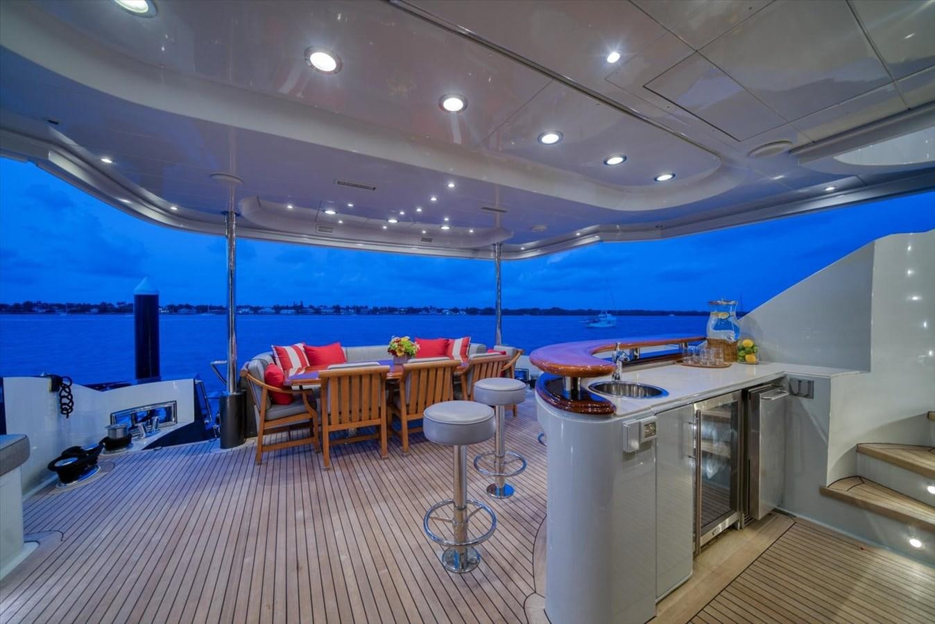 a kitchen with a large blue wall aboard TEMPTATION Yacht for Sale