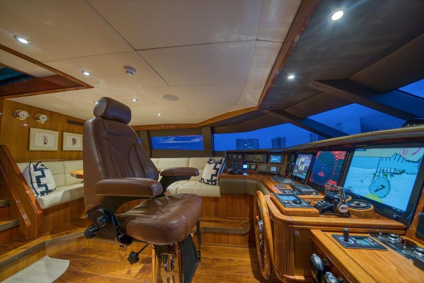 a room with computers and monitors aboard TEMPTATION Yacht for Sale