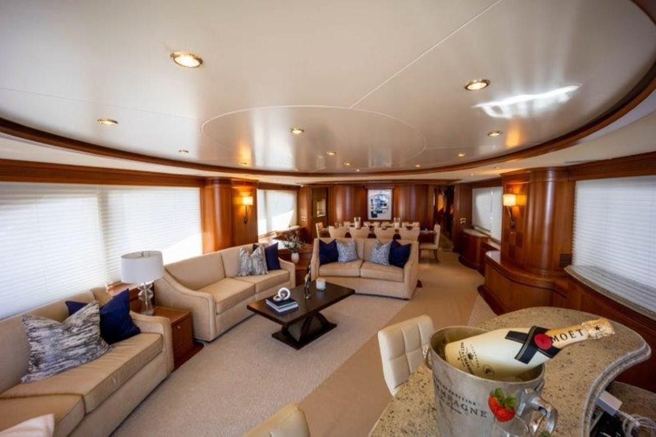 a living room with a couch and a coffee table aboard NYHAVEN Yacht for Sale