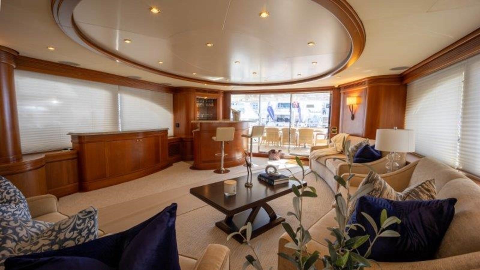 a living room with a large window aboard NYHAVEN Yacht for Sale