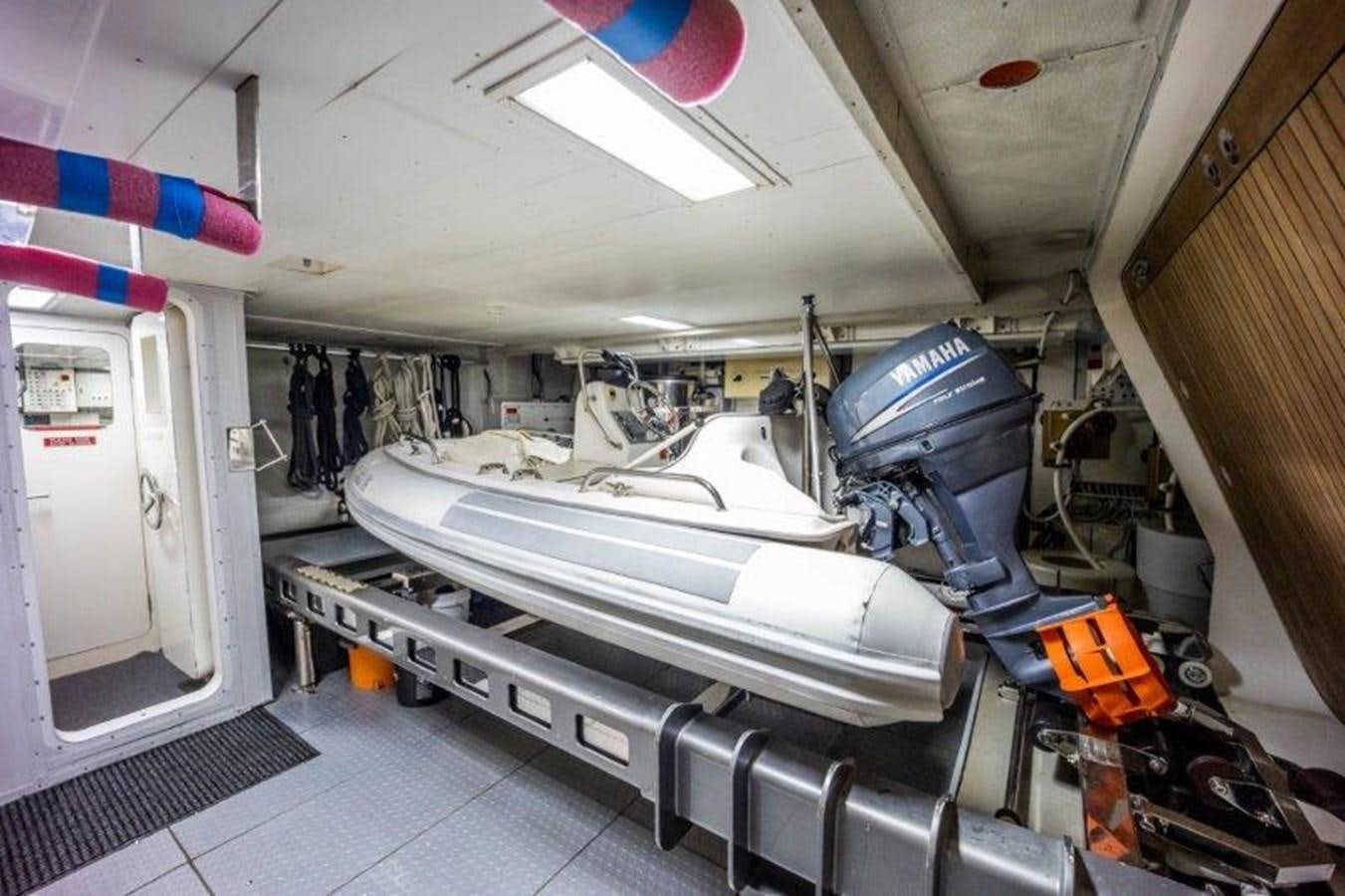 a room with a machine and a window aboard NYHAVEN Yacht for Sale