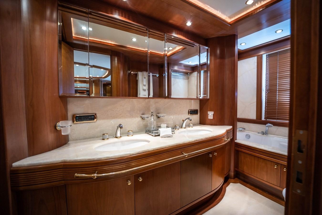 a bathroom with a large mirror aboard NYHAVEN Yacht for Sale