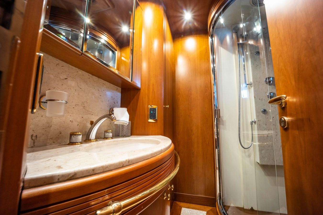 a bathroom with a shower and sink aboard NYHAVEN Yacht for Sale