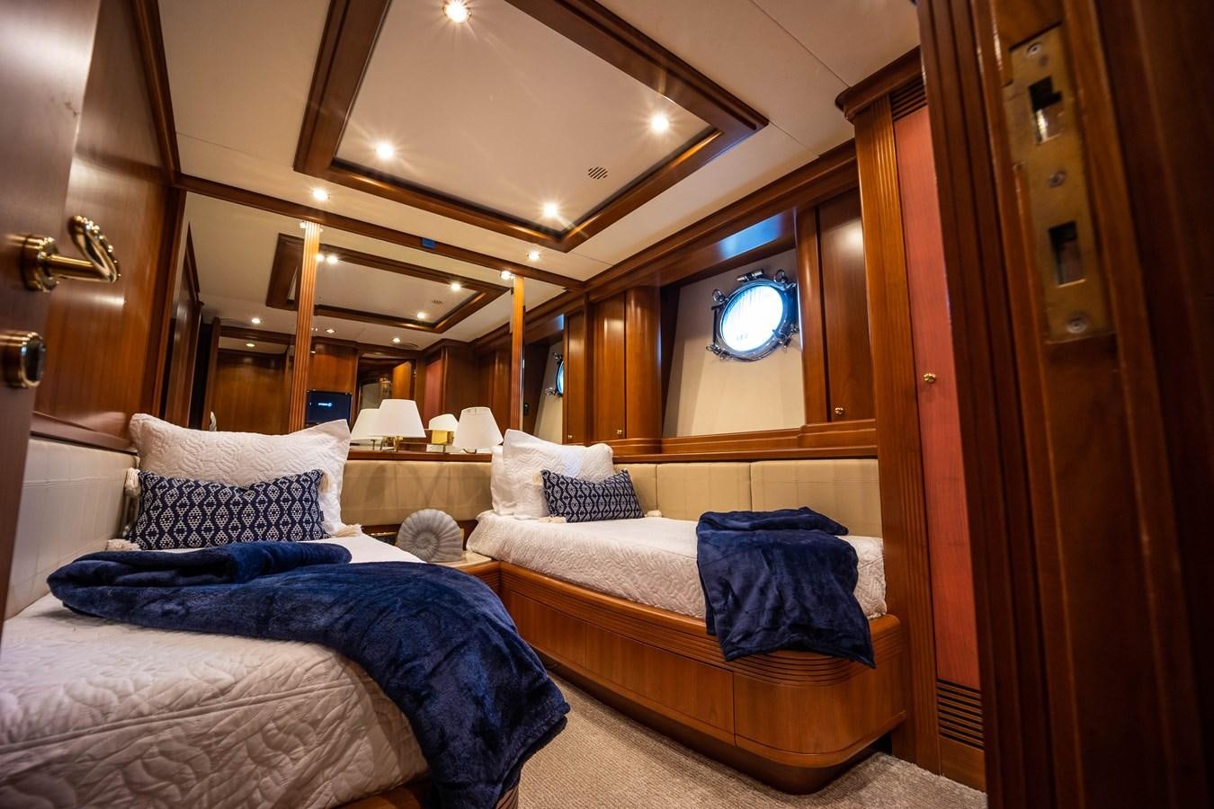 a room with two beds aboard NYHAVEN Yacht for Sale