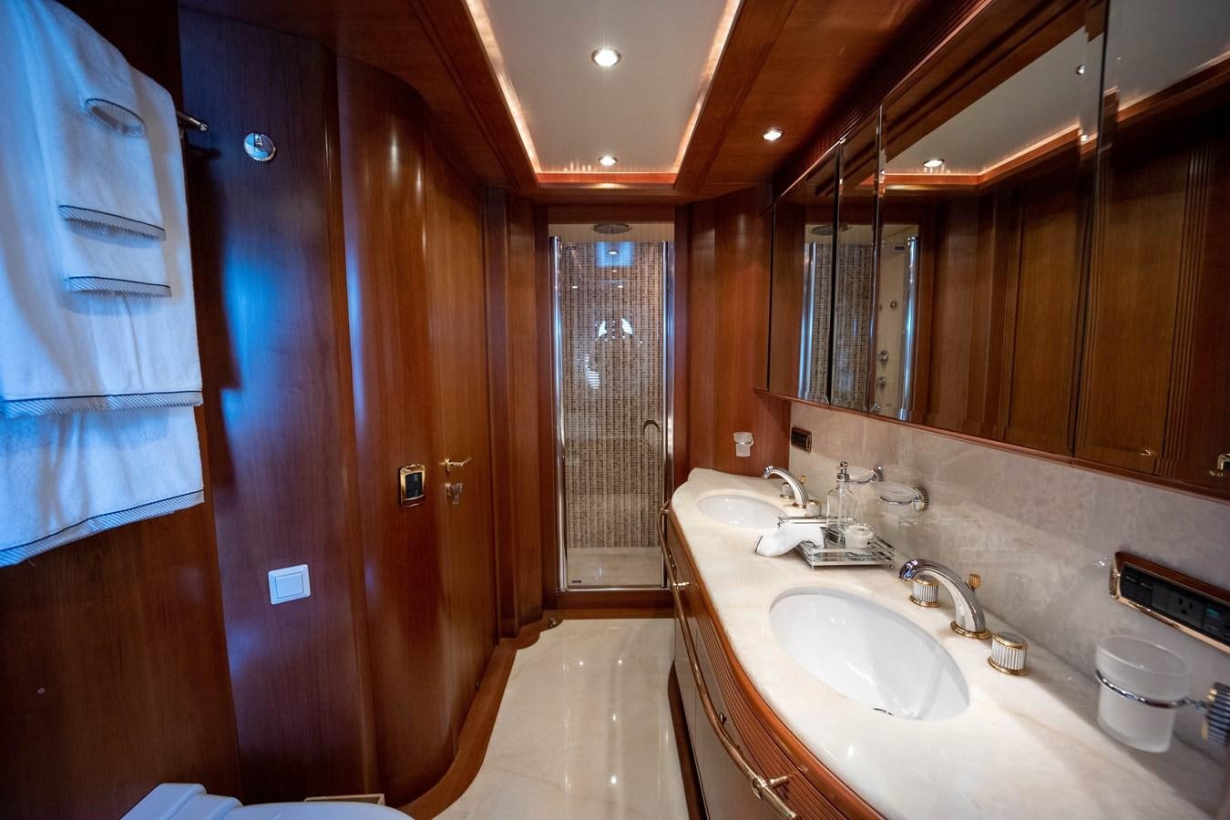 a bathroom with a sink and a mirror aboard NYHAVEN Yacht for Sale