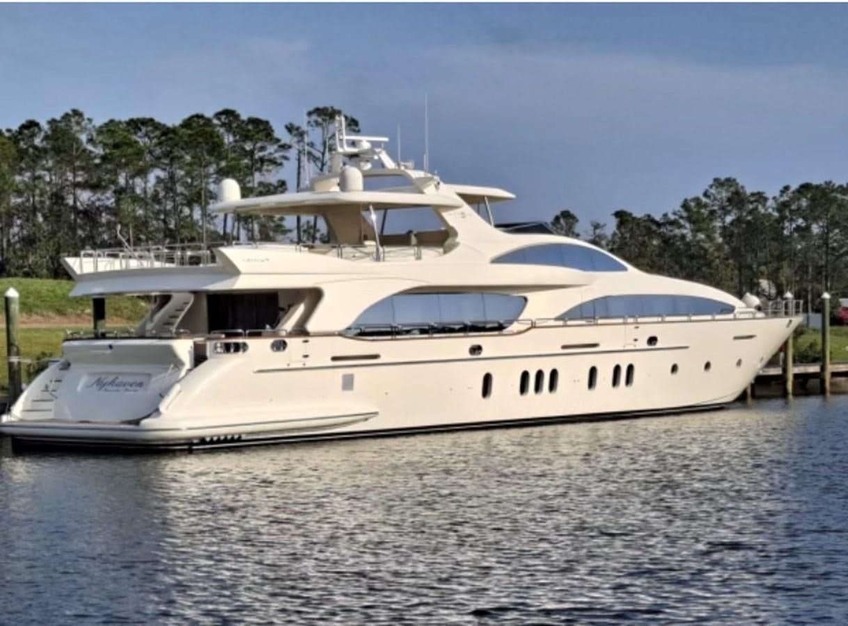 a white yacht on the water aboard NYHAVEN Yacht for Sale