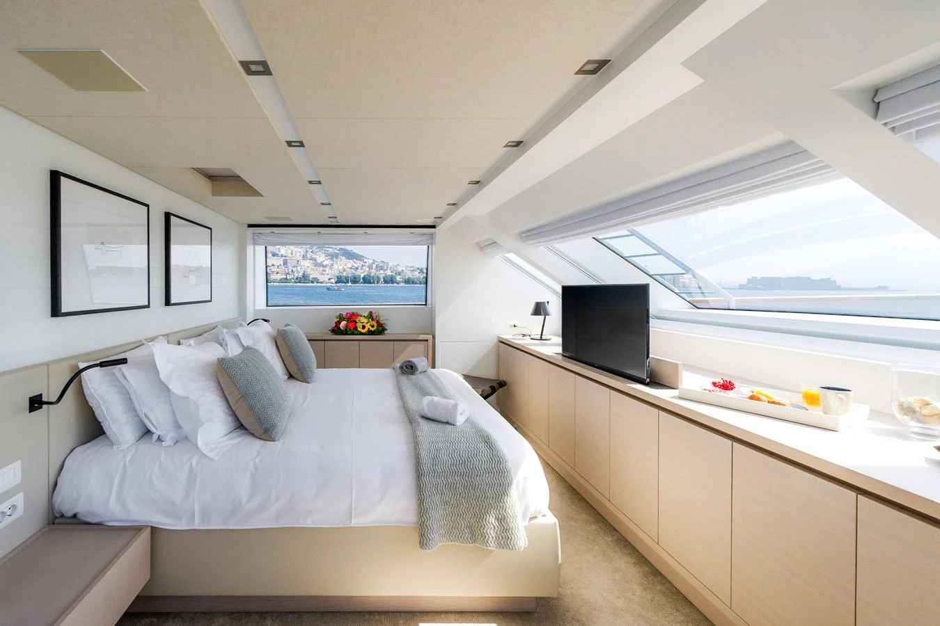 a room with a bed and a tv aboard SANLORENZO SD112 Yacht for Sale
