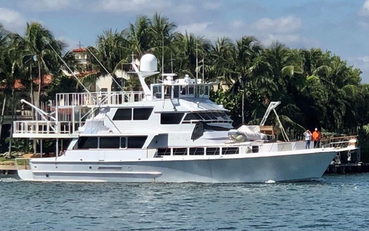 a white yacht in the water aboard TORTUGA Yacht for Sale