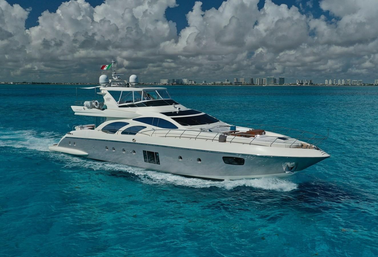 a white yacht in the water aboard VICTORIOUS Yacht for Sale