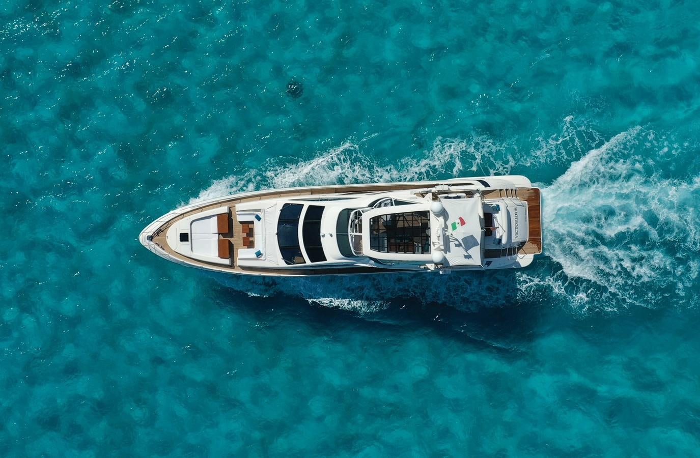 a boat in the water aboard VICTORIOUS Yacht for Sale