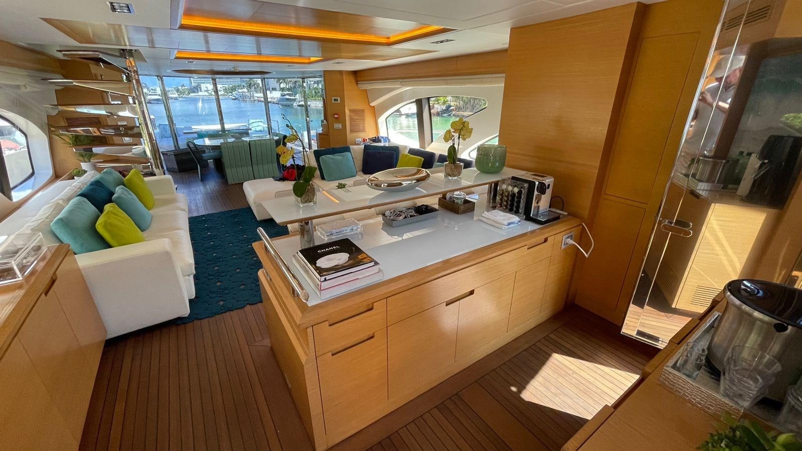 a kitchen with a large island aboard VICTORIOUS Yacht for Sale