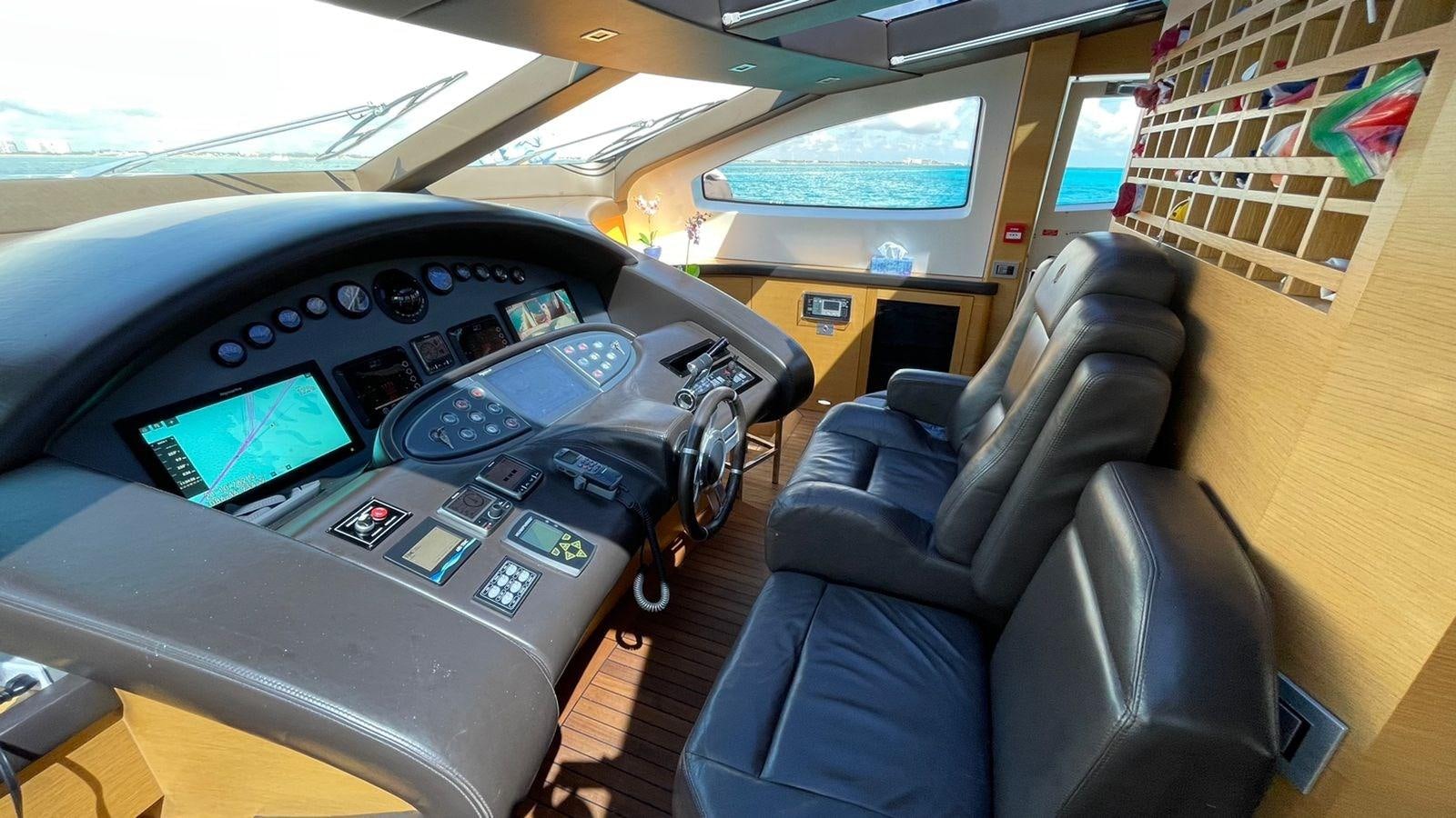 a black electronic device on a bus aboard VICTORIOUS Yacht for Sale