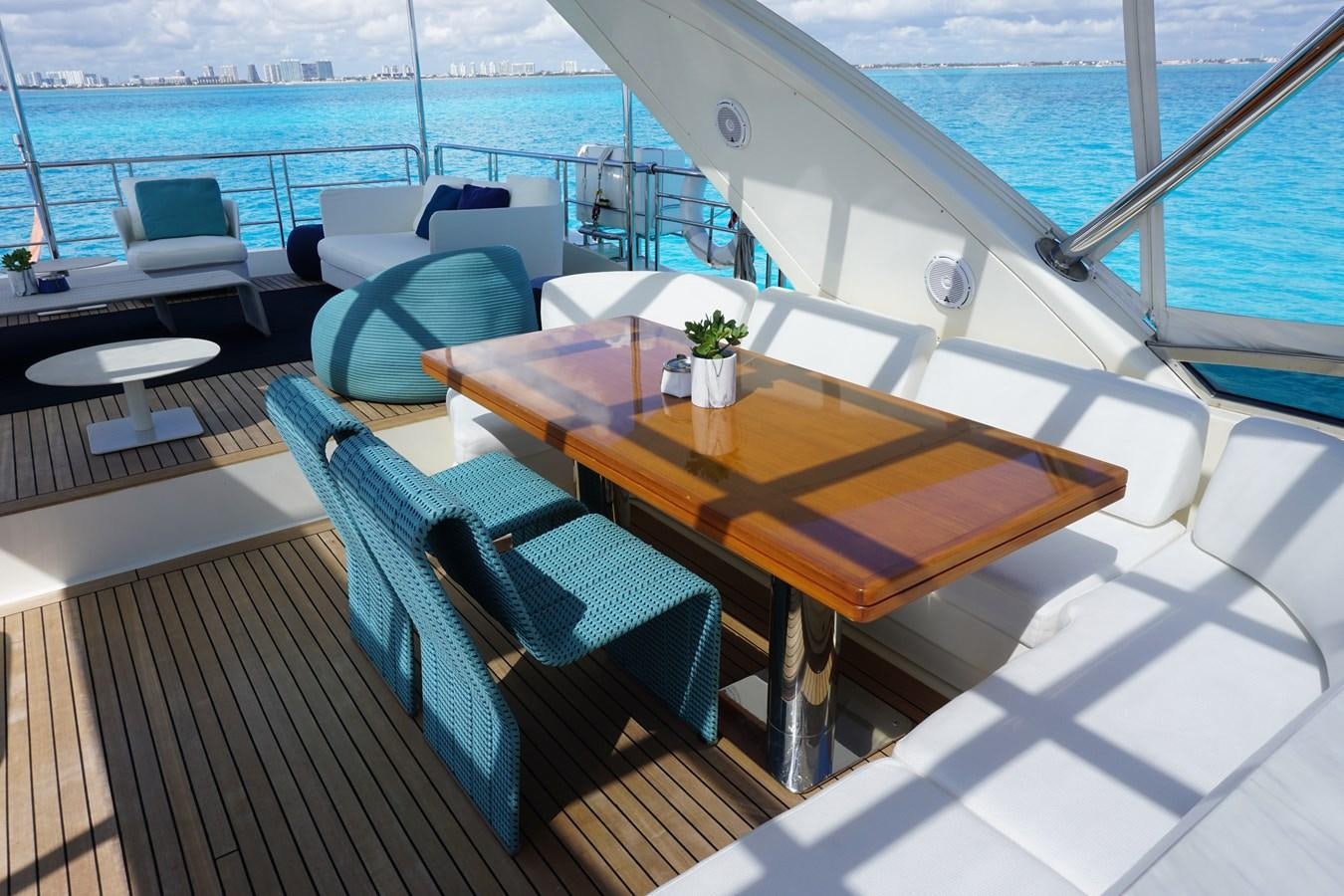 a table on a boat aboard VICTORIOUS Yacht for Sale