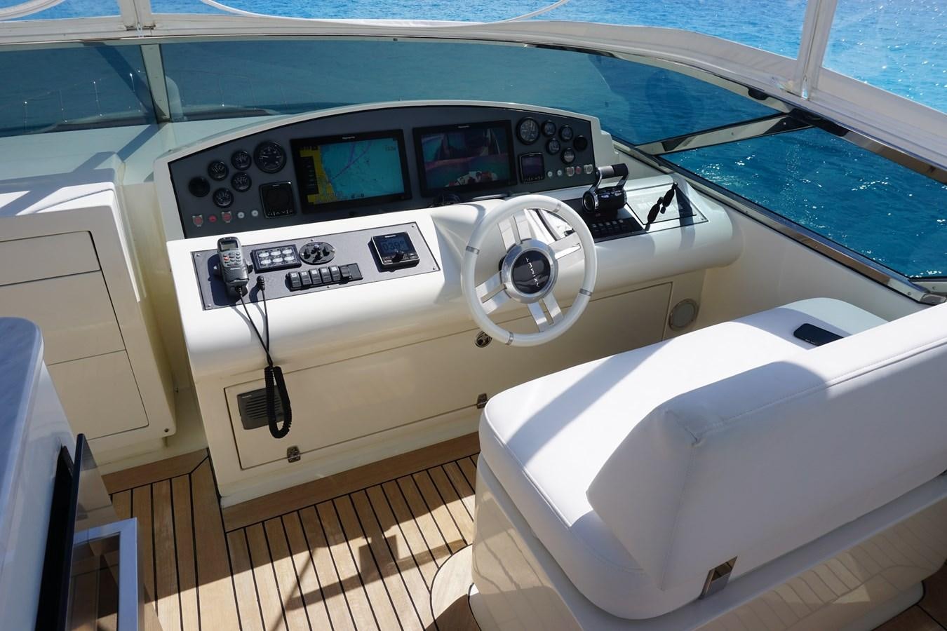 a boat with a steering wheel aboard VICTORIOUS Yacht for Sale