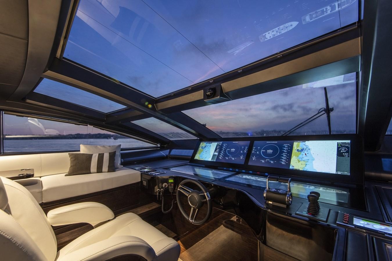 a room with a large screen aboard AMIRA Yacht for Sale