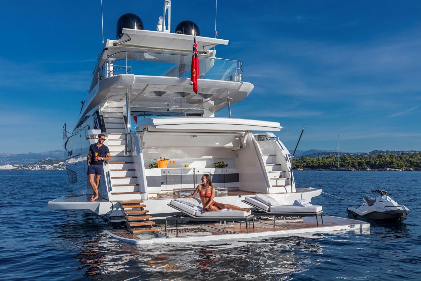 a couple of people on a boat aboard AMIRA Yacht for Sale