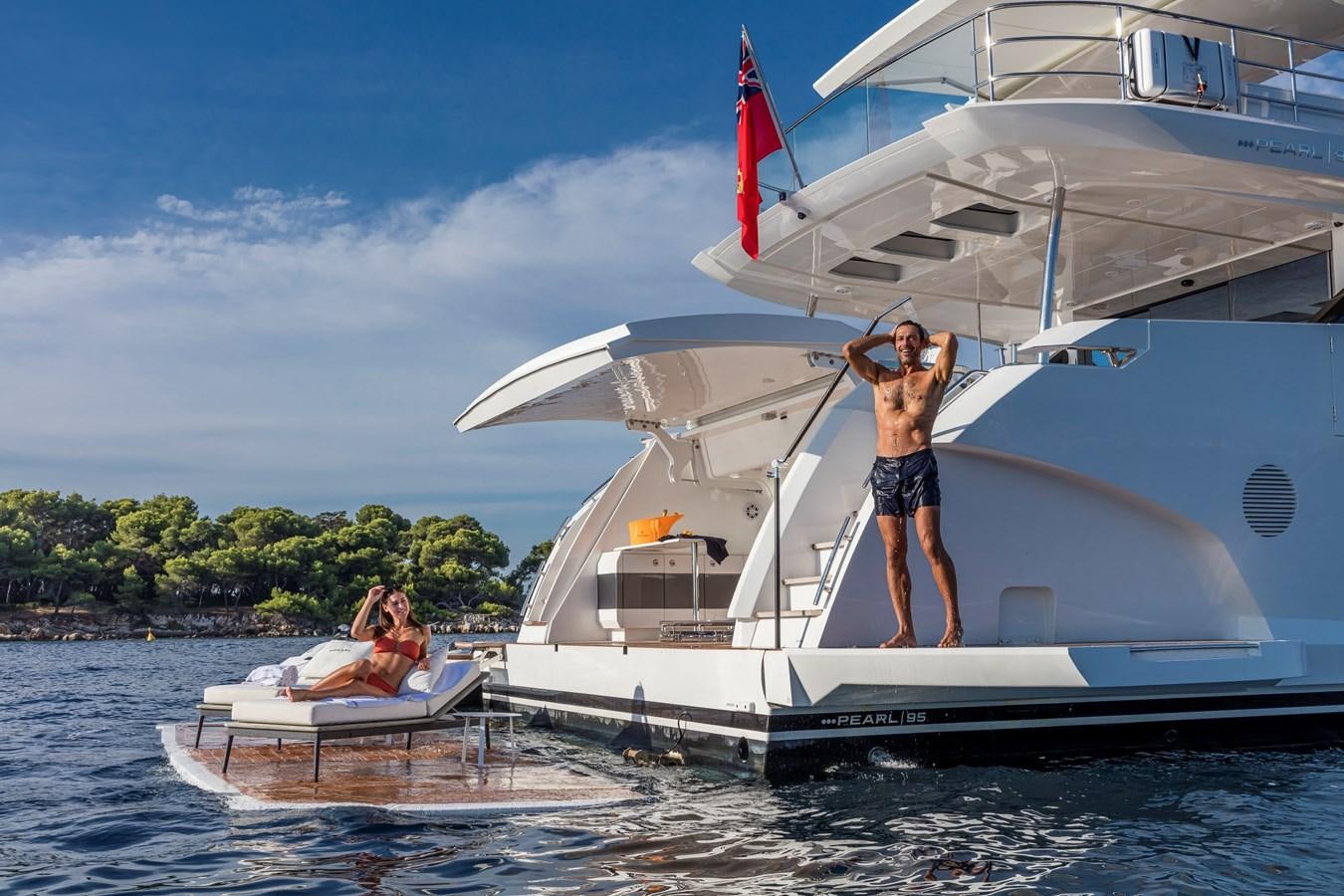 a person standing on a boat aboard AMIRA Yacht for Sale