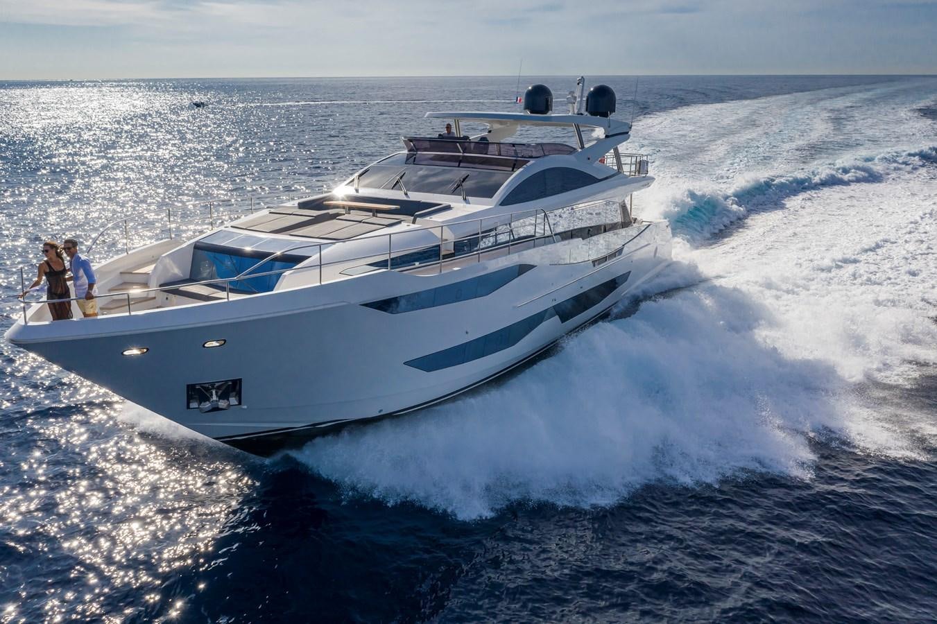 a white boat with people on it aboard AMIRA Yacht for Sale