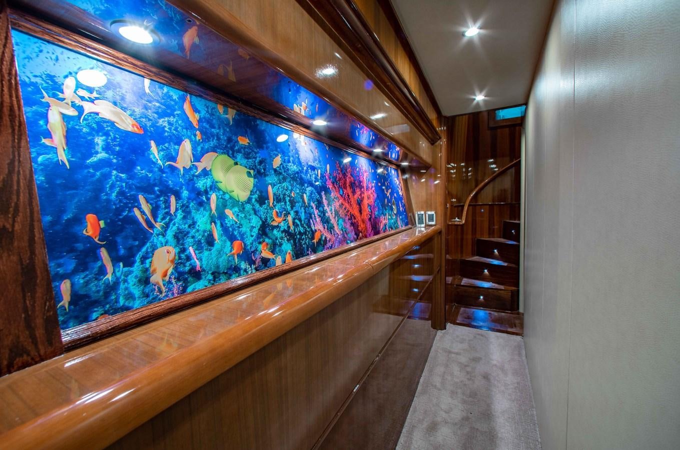 a hallway with a large map aboard CURIOUS GEORGE Yacht for Sale