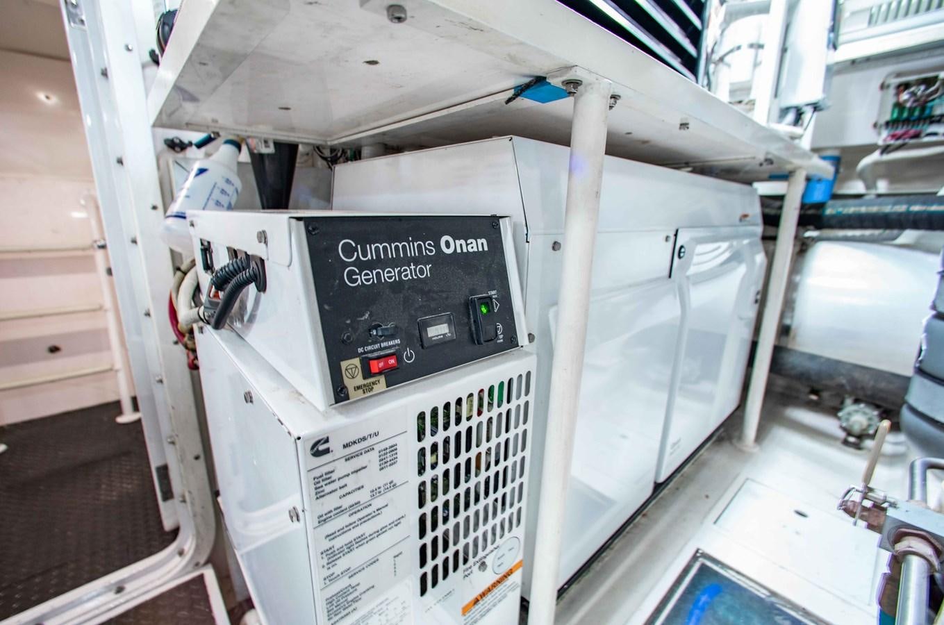 a large white machine with a black label on it aboard CURIOUS GEORGE Yacht for Sale