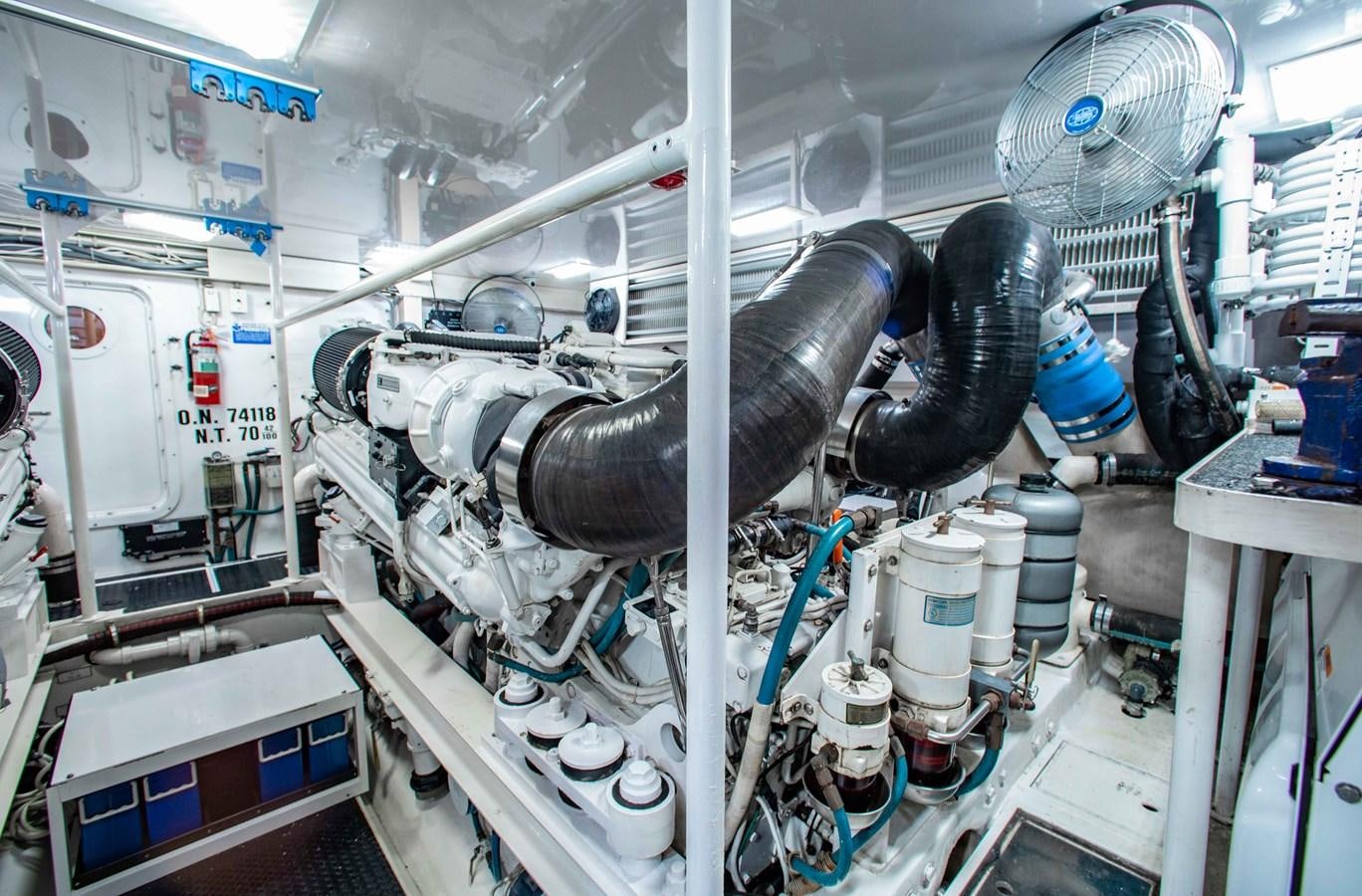 a machine with a large metal pipe aboard CURIOUS GEORGE Yacht for Sale