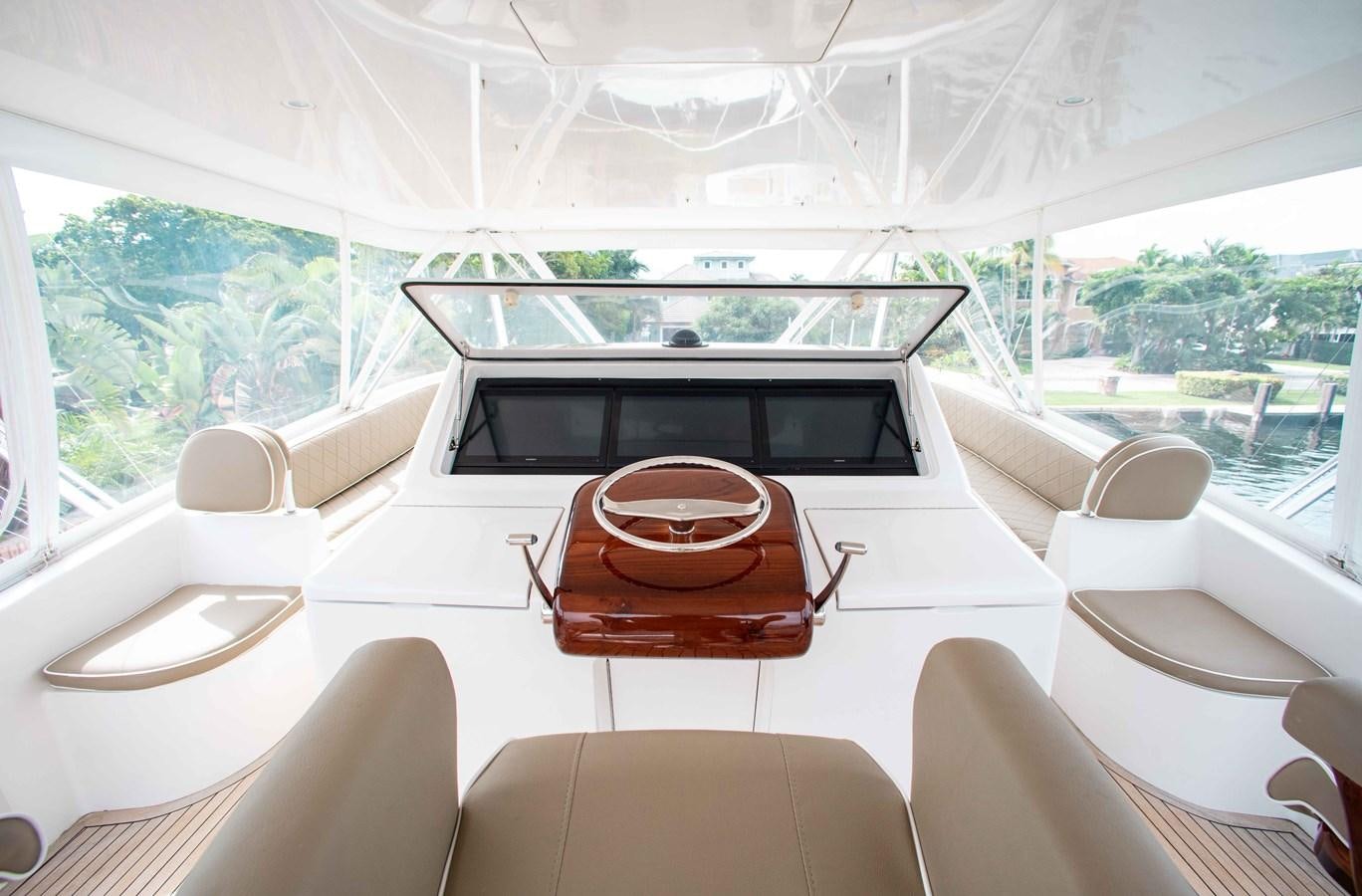 inside of a car aboard CURIOUS GEORGE Yacht for Sale