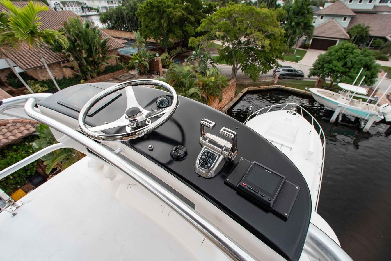 a car with a broken steering wheel aboard CURIOUS GEORGE Yacht for Sale