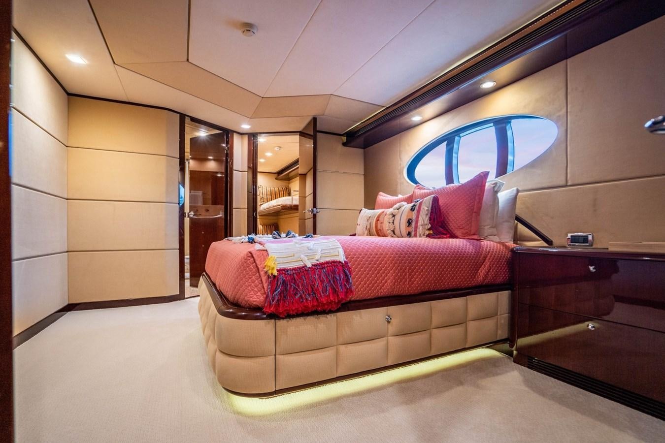 a bed in a room aboard DREAMER Yacht for Sale