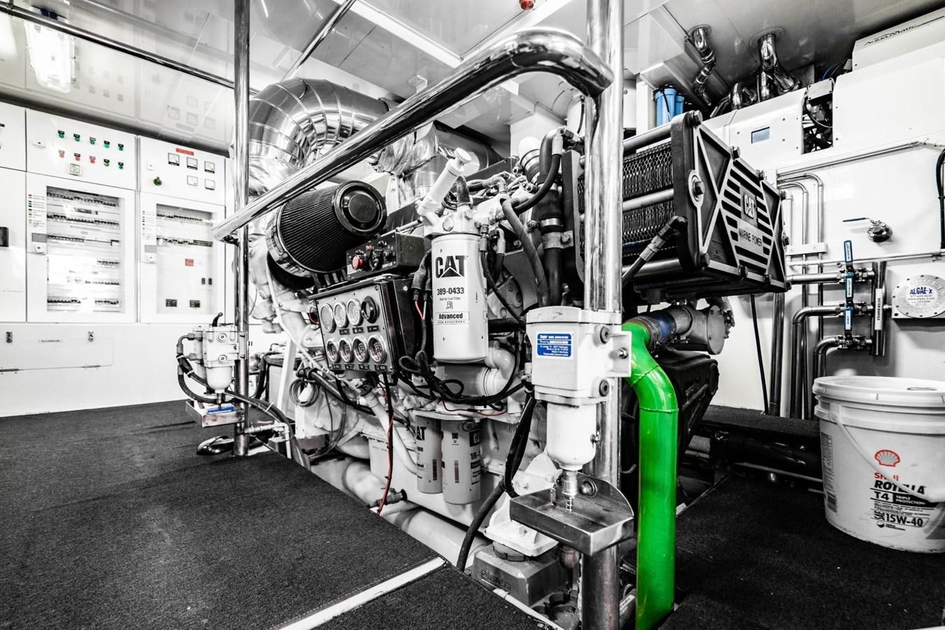 a machine in a room aboard DREAMER Yacht for Sale