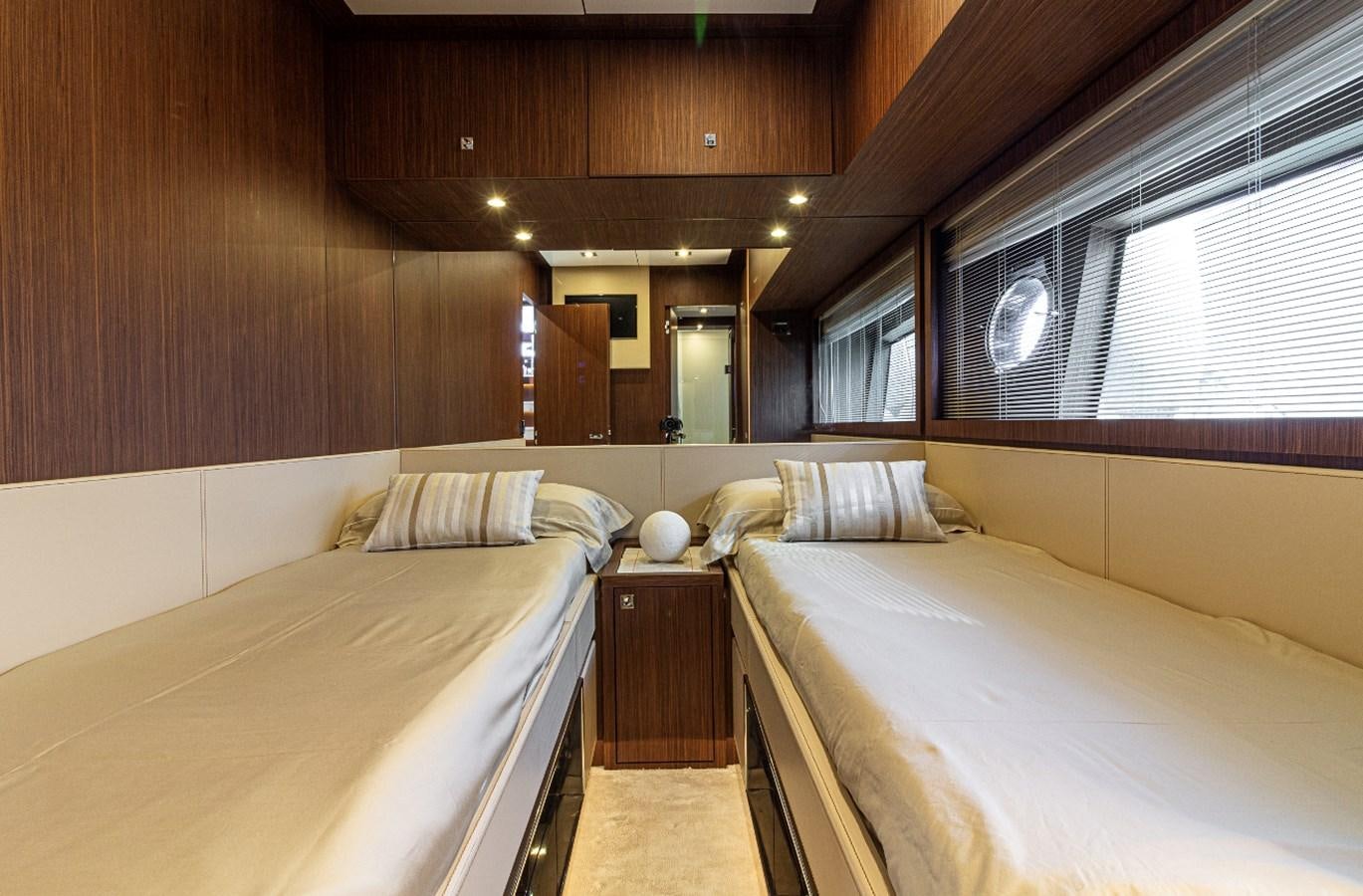 a room with two beds aboard DONNA SANTA Yacht for Sale