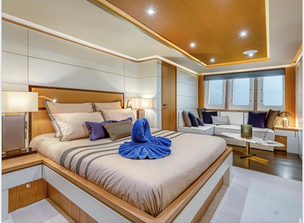 a large bedroom with a bed aboard MILLESIME Yacht for Charter