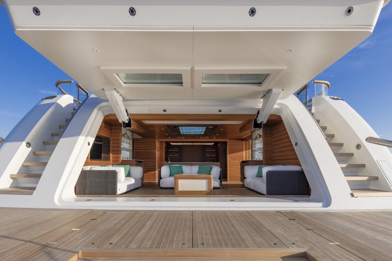 a large open space with a pool aboard C Yacht for Sale