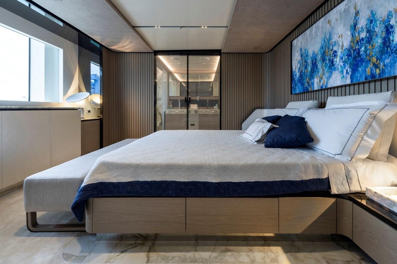 a bed with white sheets aboard C Yacht for Sale
