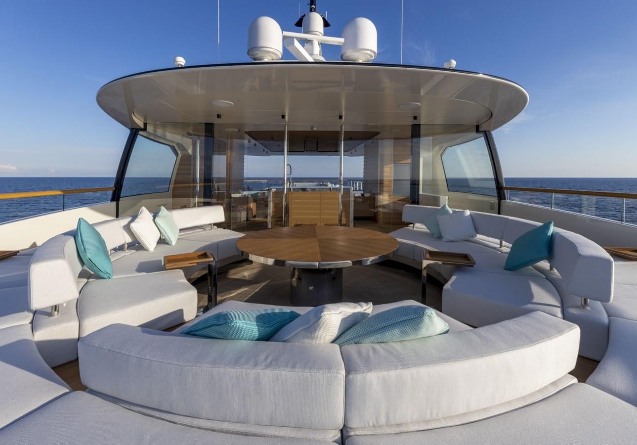 a large room with a couch and a table aboard C Yacht for Sale