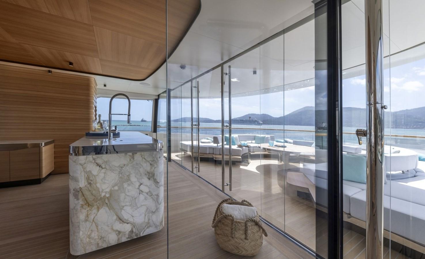 a room with a large window aboard C Yacht for Sale
