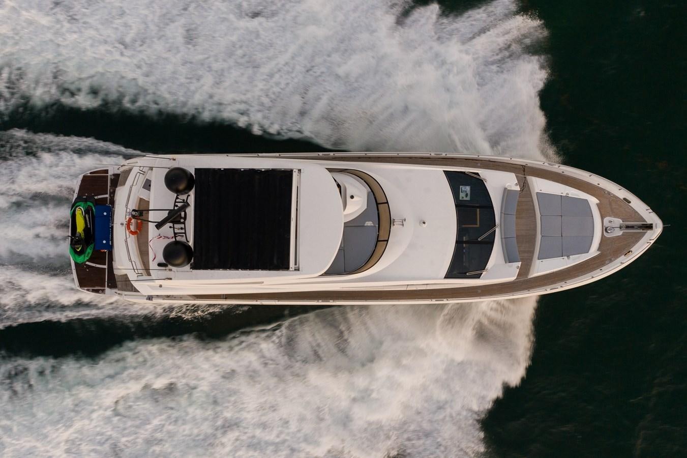 a white car on a snowy road aboard SEADUCTION Yacht for Sale