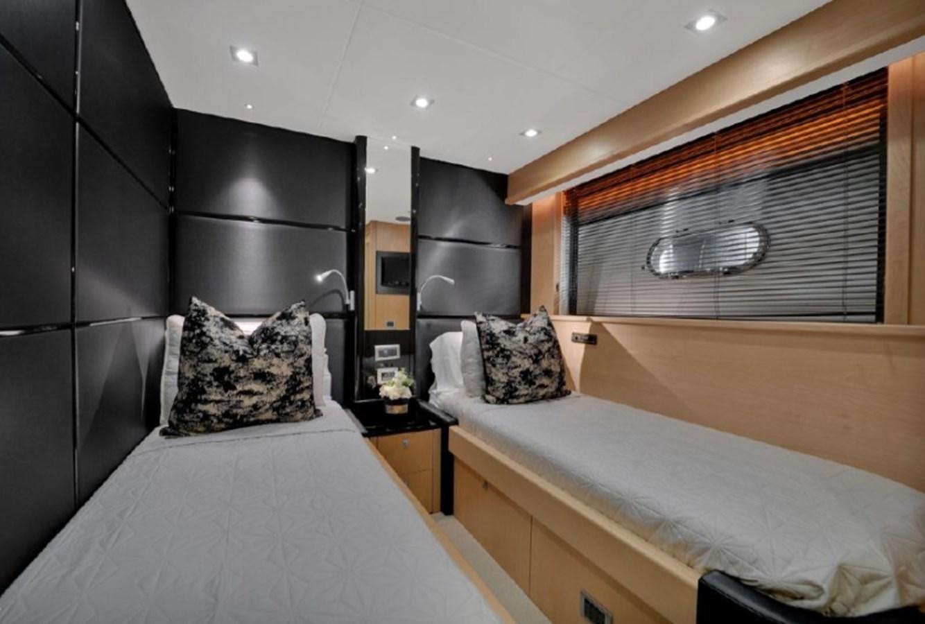 a room with two beds aboard SEADUCTION Yacht for Sale