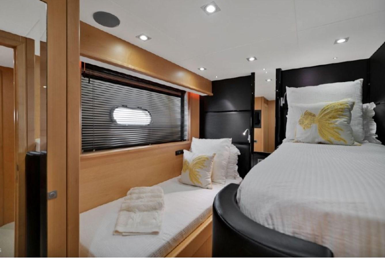 a room with two beds aboard SEADUCTION Yacht for Sale