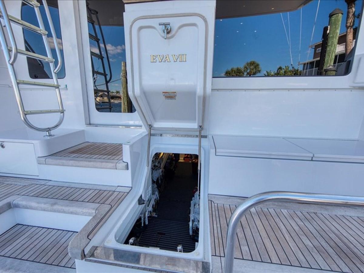 a white boat with a door open aboard EVA VII Yacht for Sale