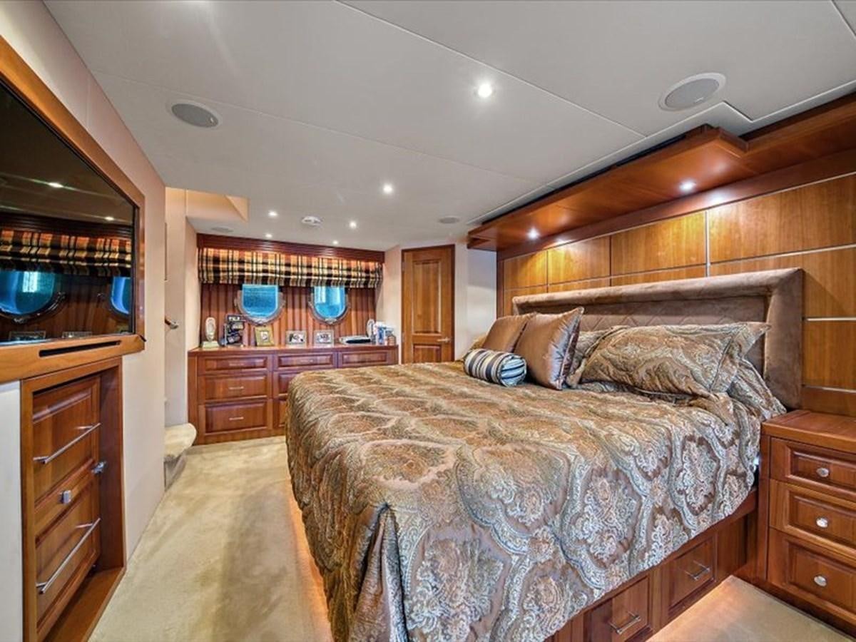 a bed in a room aboard EVA VII Yacht for Sale